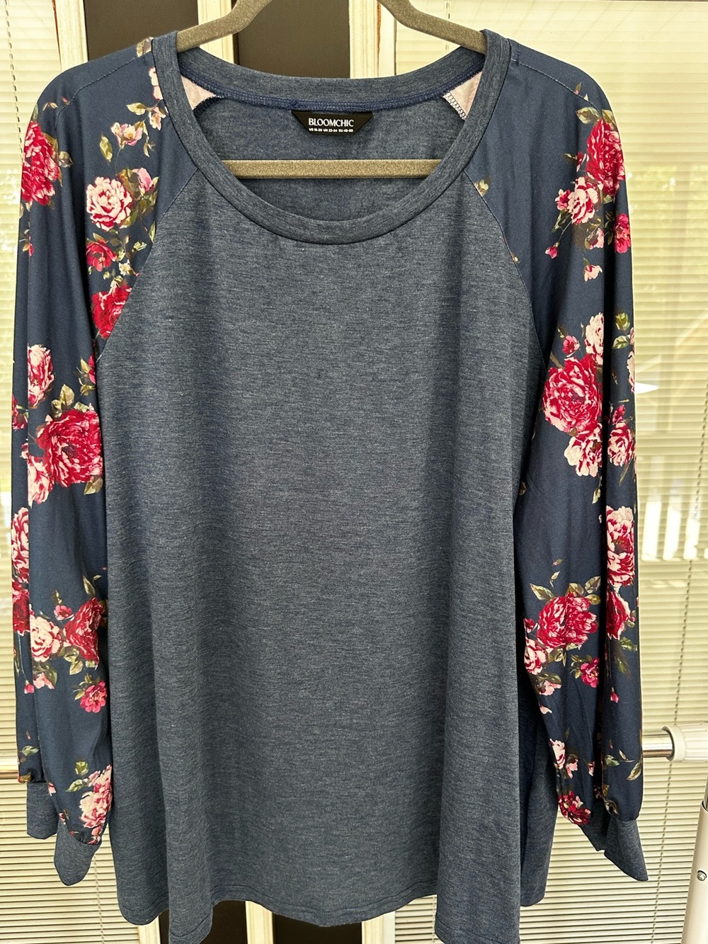 Size 18-20 BloomChic Navy Floral Raglan Long Sleeve Top w/ floral sleeves. NWOT!